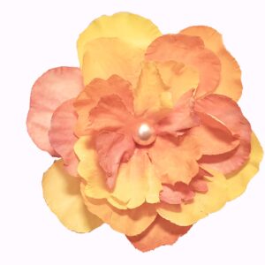 Handpainted orange and yellow flower pin symbolizing healing, joy, and divine connection. A radiant artisan piece for spiritual renewal.